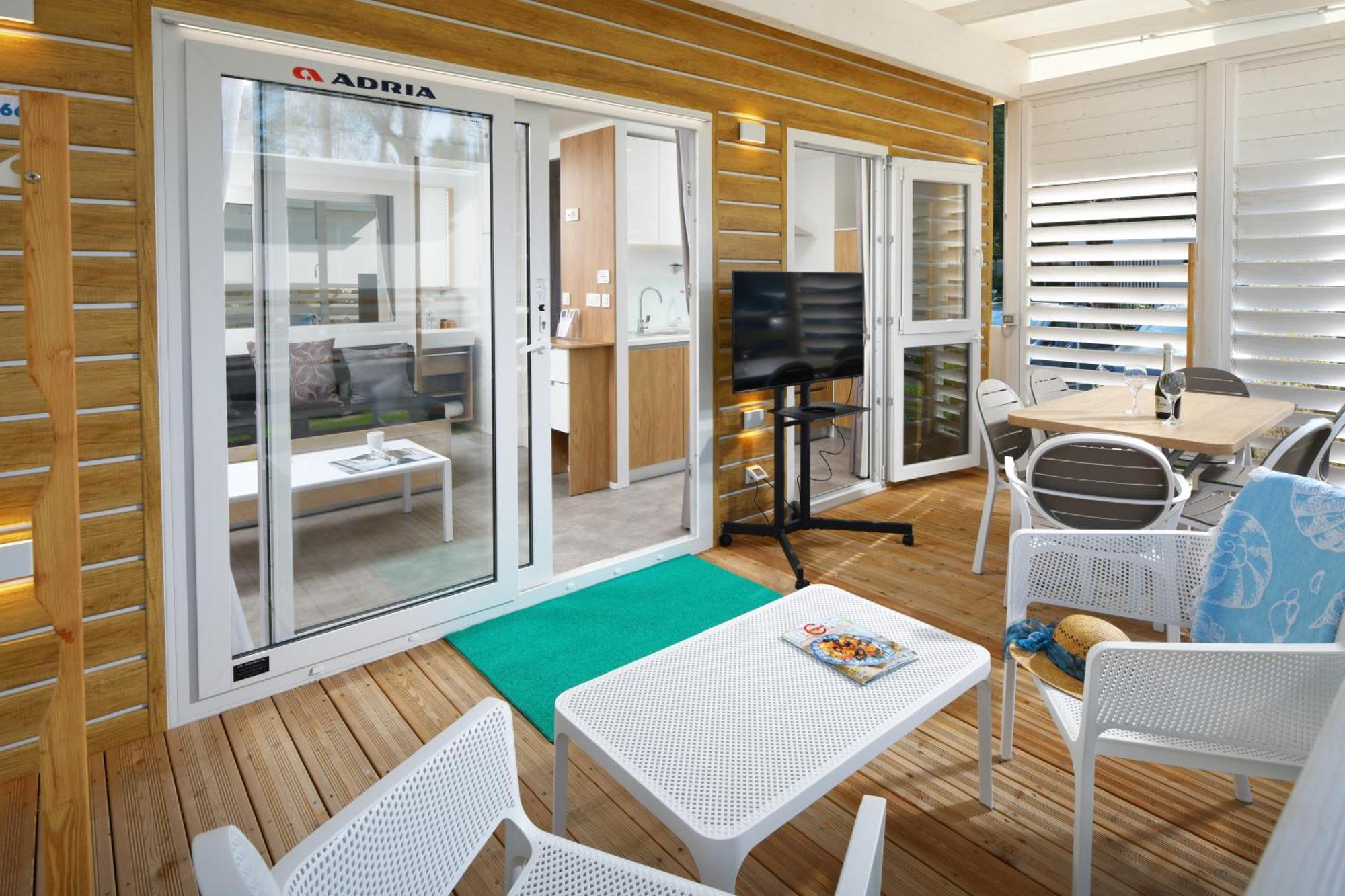 Barricata Holiday Village Scardovari Exterior photo A sliding door